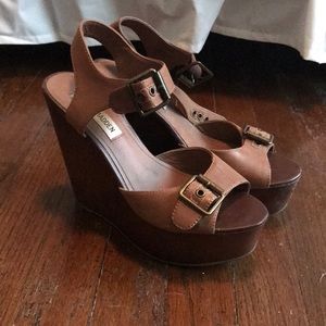 Brown buckle wedges